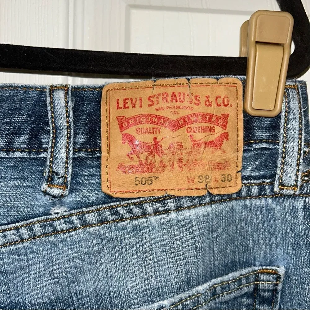 Levi’s 505 Distressed Denim Jeans